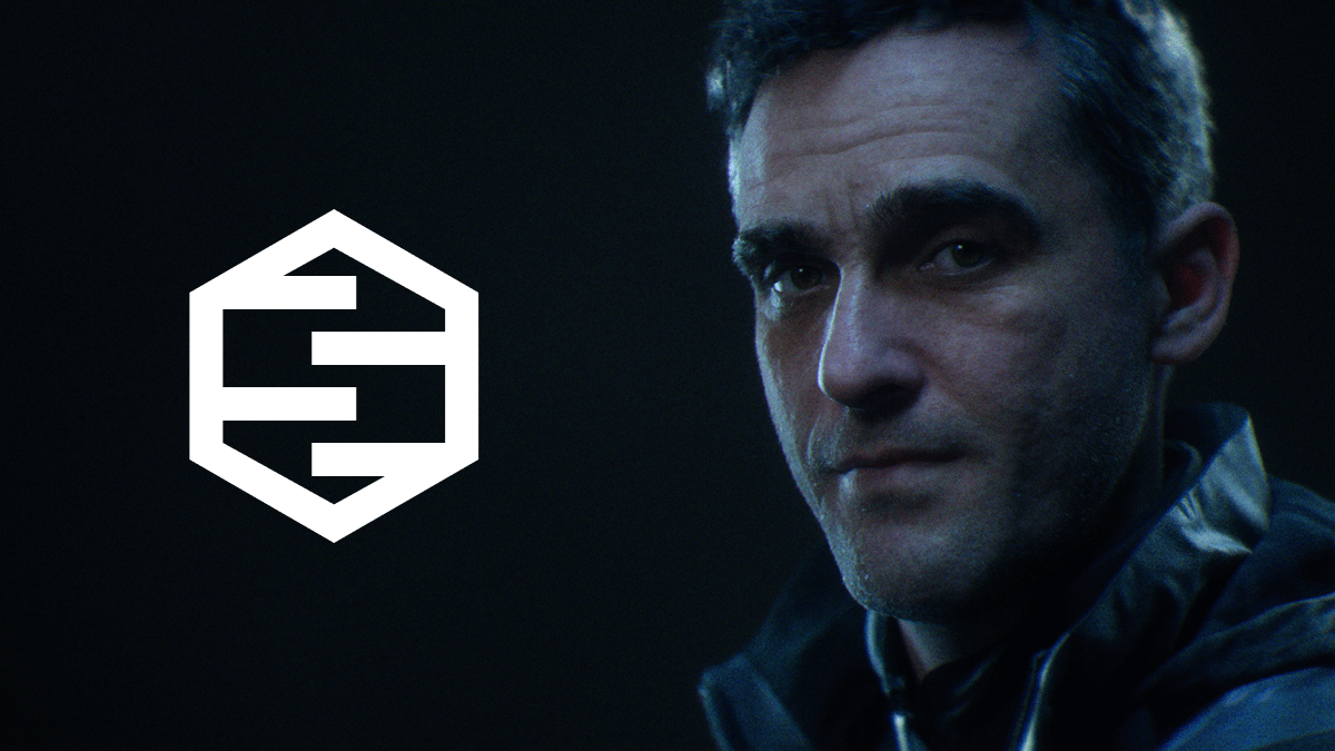 Realistic MetaHuman character beside the MetaHuman emblem