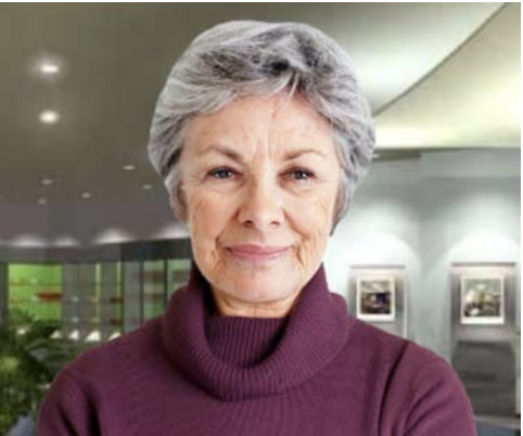 LISSA conversational avatar presented as an older woman in a purple sweater against an indoor background