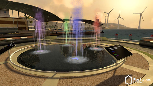 PlayStation Home Square fountain with colored water jets, a poll display and wind turbines across the harbor